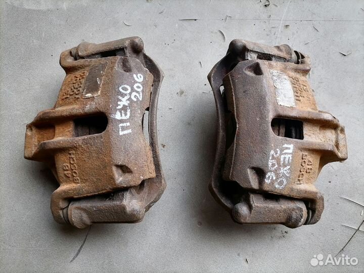 Суппорт тормозной передний Peugeot 206 1998-2012