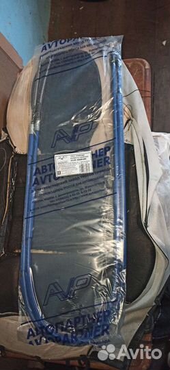 Трос привода ручного тормоза