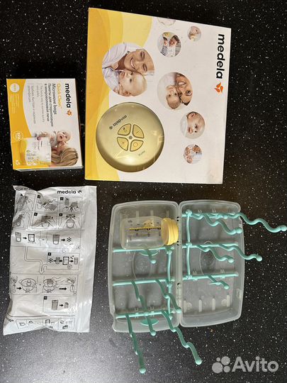 Молокоотсос medela электрический новый