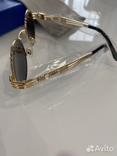 Солнечные очки женские