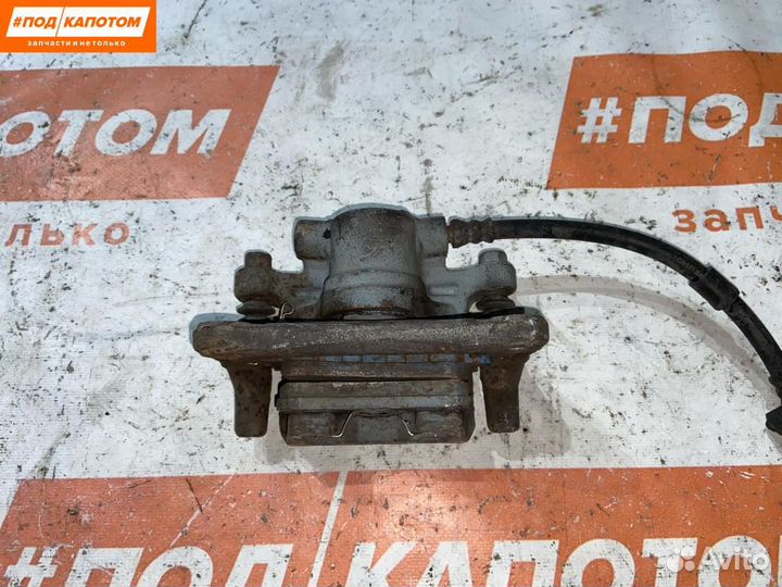 Суппорт тормозной задний левый Mitsubishi 2