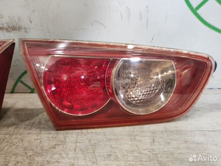 Фонарь в крышку багажника задний Mitsubishi Lancer