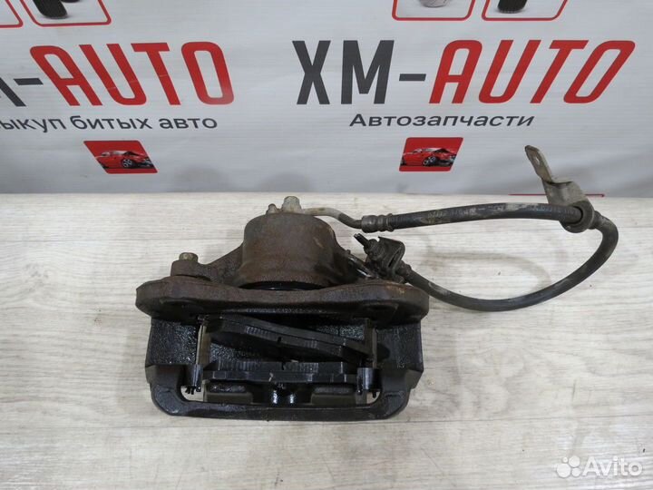 Суппорт тормозной передний правый KIA Sportage 3