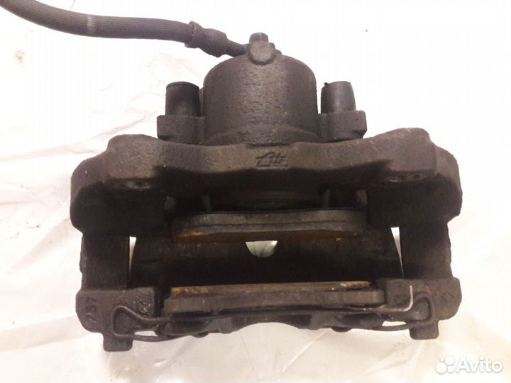 Суппорт Opel Astra H / Zafira B левый - правый