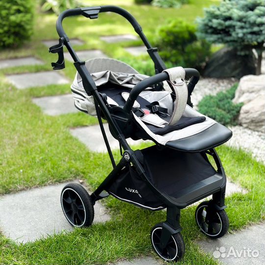 Прогулочная коляска с реверсивным блоком