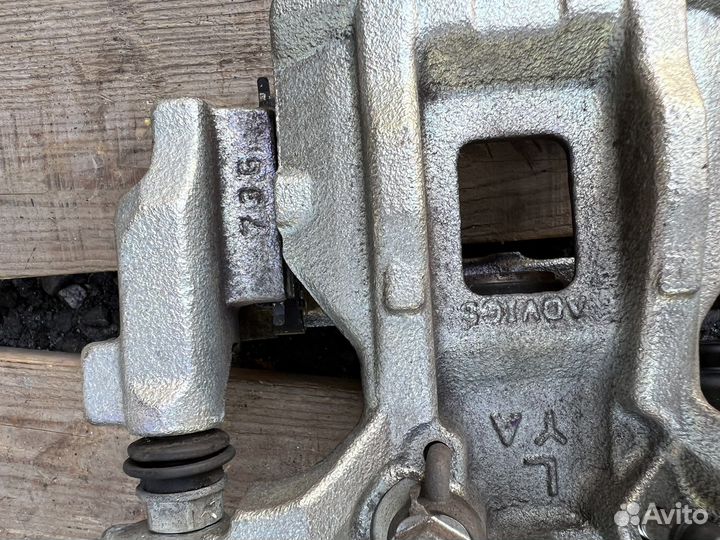 Супорт тормозной задний с электро ручником