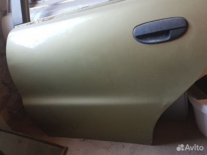 Дверь задняя левая ланос,правая сторона