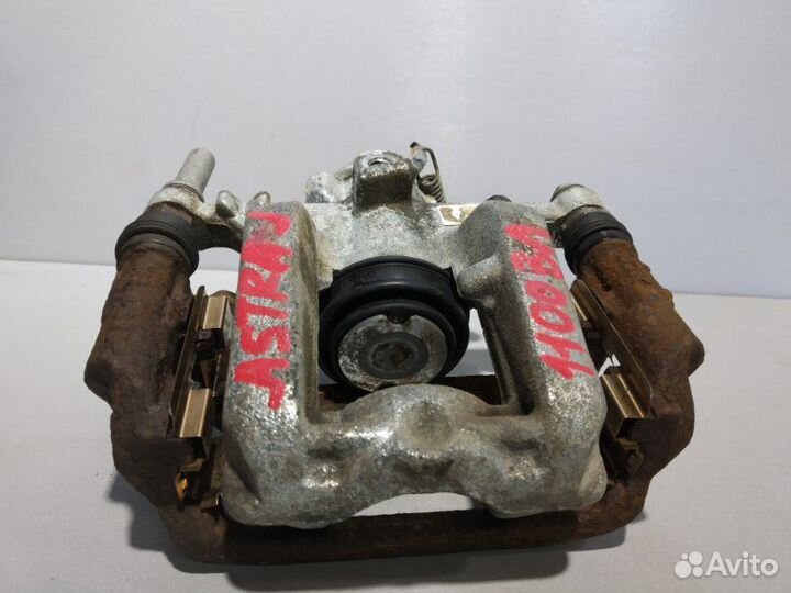 Суппорт задний левый Opel Astra J хэтчбек A14NET