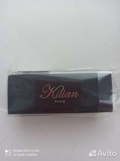 Kilian Woman in gold