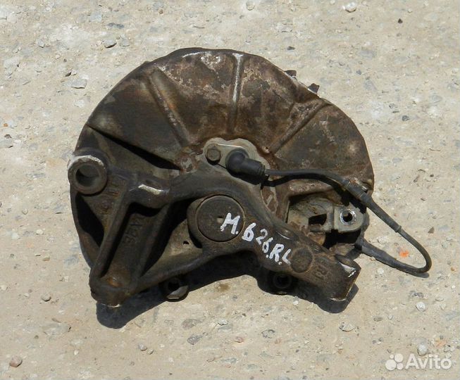 Кулак задний левый Mazda 626 GE