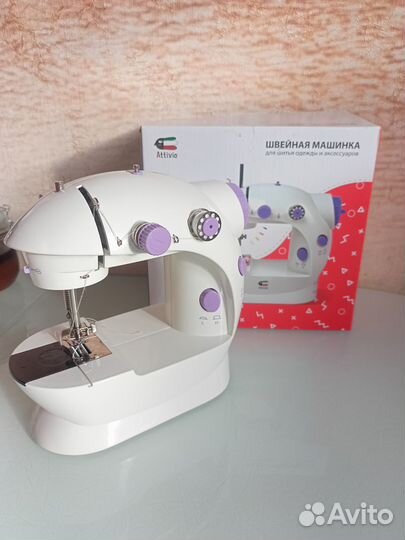 Электрическая швейная машинка