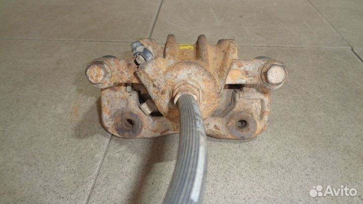 Суппорт задний левый Hyundai Sonata 4 (EF)