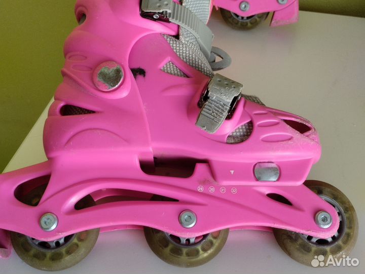 Роликовые коньки