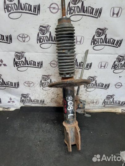 Амортизатор передний левый Peugeot 308