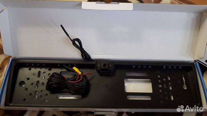 Камера заднего вида в рамке номера