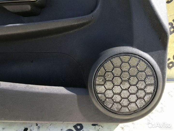 Обшивка двери передней левой Opel Corsa D