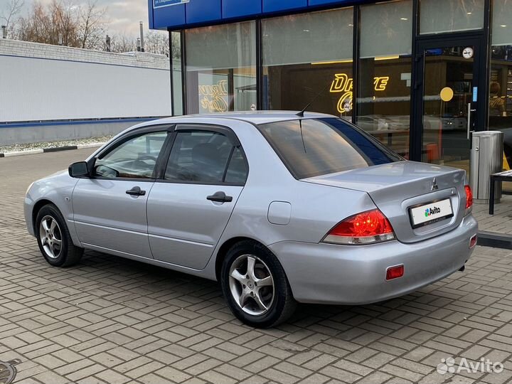Mitsubishi Lancer 1.3 МТ, 2003, 261 000 км