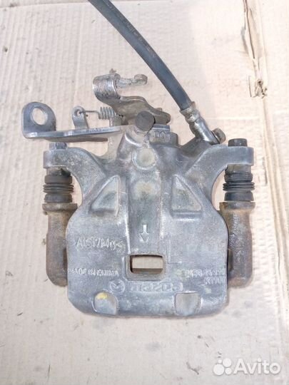 Суппорт задний левый Mazda 3 BM