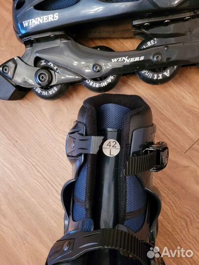 Роликовые коньки