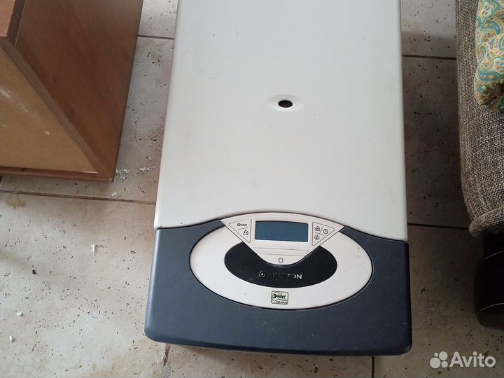 Газовый котел двухконтурный аристон