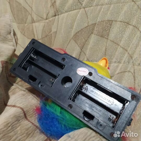 Игрушка говорящий попугай