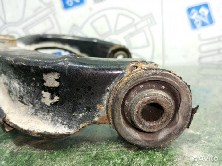 Рычаг передний левый верхний Nissan Navara D40