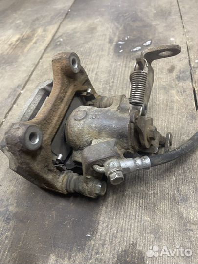 Суппорт тормозной задний Mazda CX-5