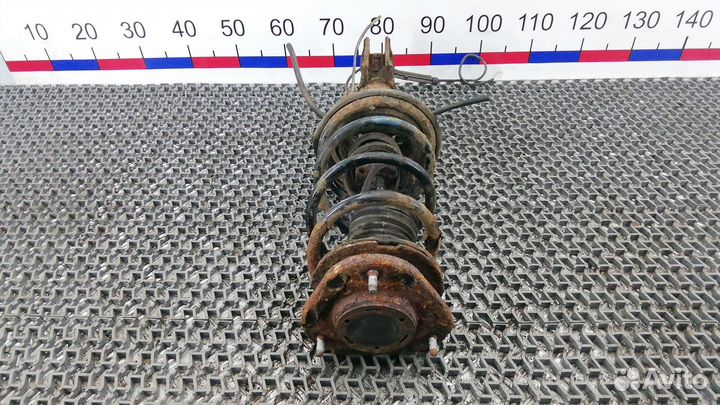 Стойка передняя Toyota Corolla (00-06 года) NZE120