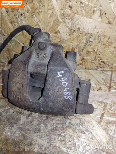 Суппорт тормозной передний правый Mazda 3 BL