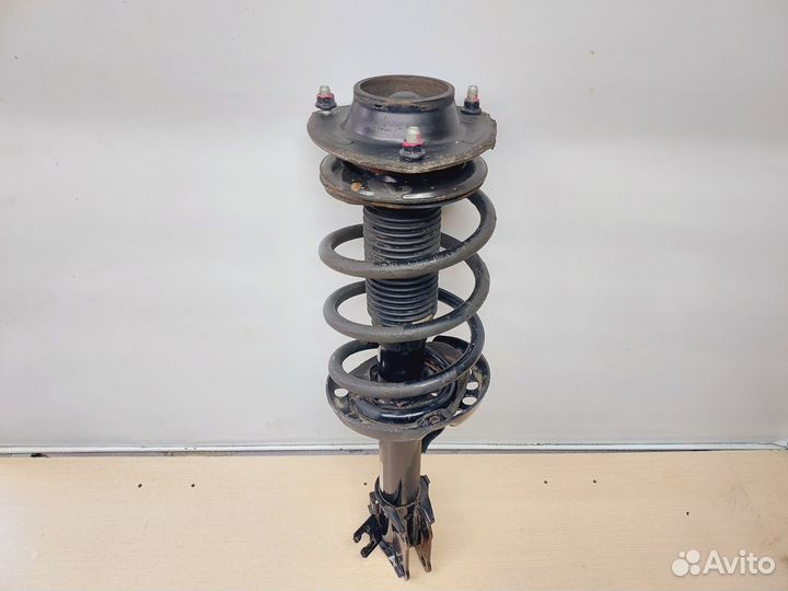 Стойка передняя левая KIA Sportage 2