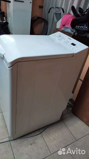 Стиральная машина с вертикальной загрузкой