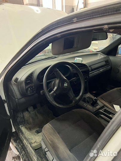 Запчасти на bmw е318i