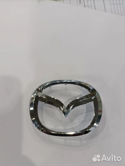 Эмблема на руль mazda 6