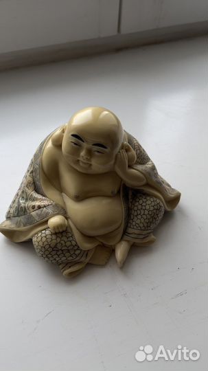 Статуэтка будды