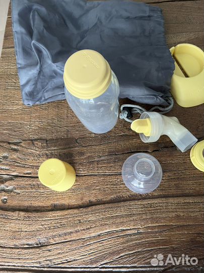 Молокоотсос medela электрический