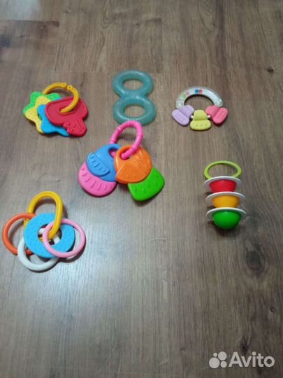 Прорезыватель, погремушки,игрушка на коляску. нева