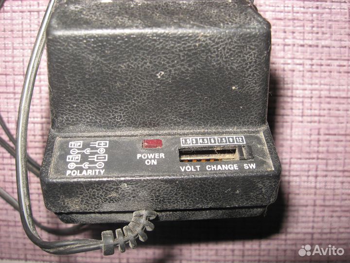 Блок питания eleka universal AC-DC adaptor 1,5-12V