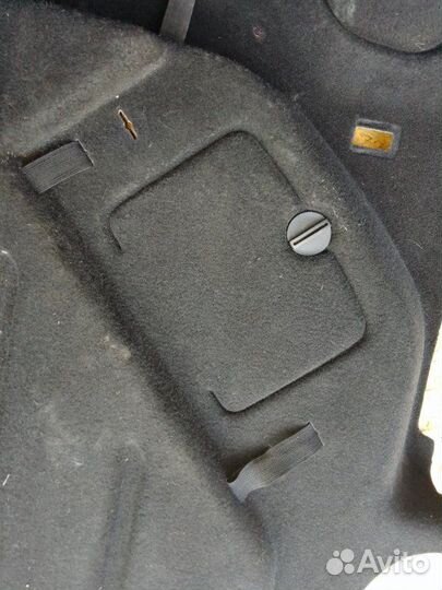 Обшивка багажника левая Opel Astra J седан 1.6