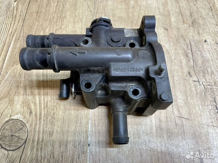 Фланец термостата корпус Opel Astra H