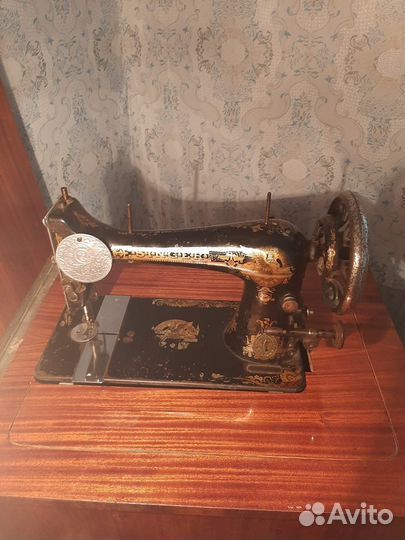 Швейная машинка зингер