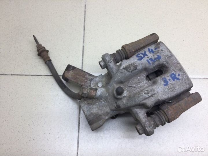 Суппорт тормозной задний задний правый Suzuki Sx4