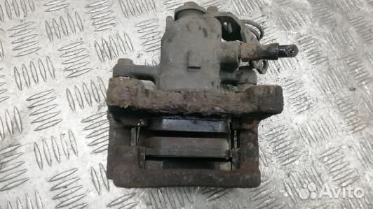 Суппорт тормозной задний левый ford kuga 1 (OKR07M