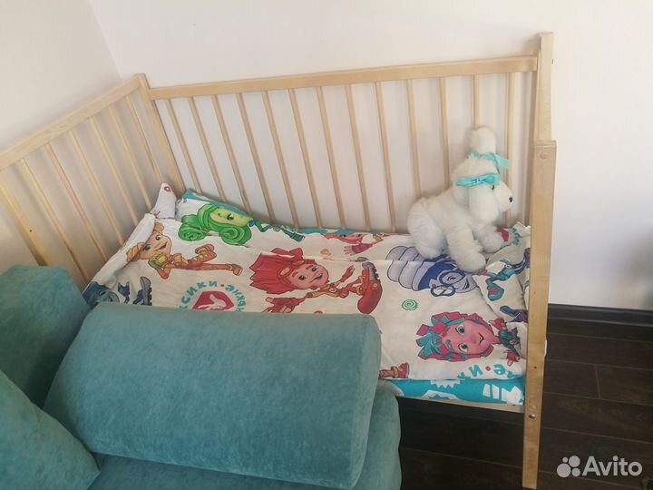 Детская кроватка маятниковая