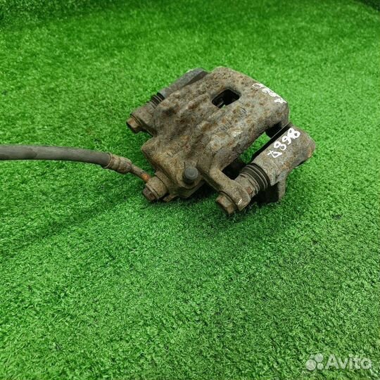 Суппорт тормозной задний левый SsangYong Actyon 2