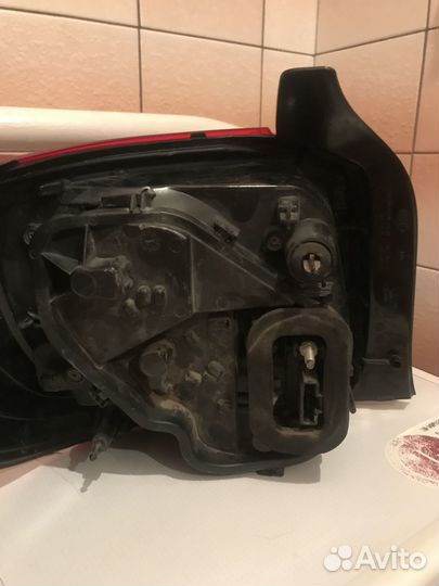 Фонарь задний Логан