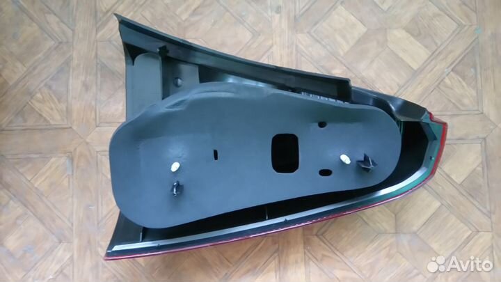 Задний фонарь лев. (желтый поворот.) Logan 2004-09