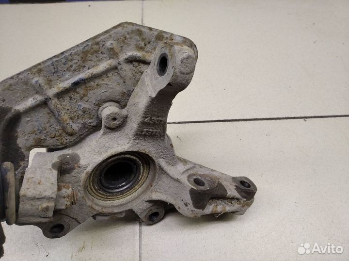 Кулак поворотный передний левый Doblo 2005-2015