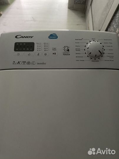Стиральная машина Candy с вертикальной загрузкой
