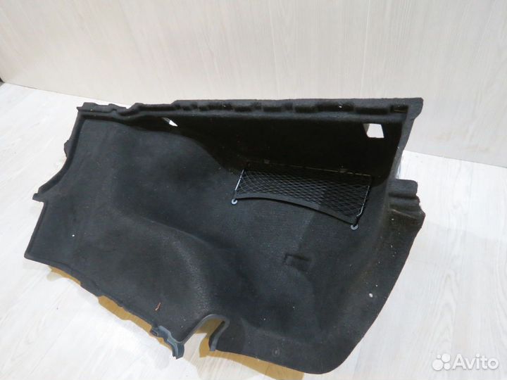 Обшивка багажника левая Kia Quoris