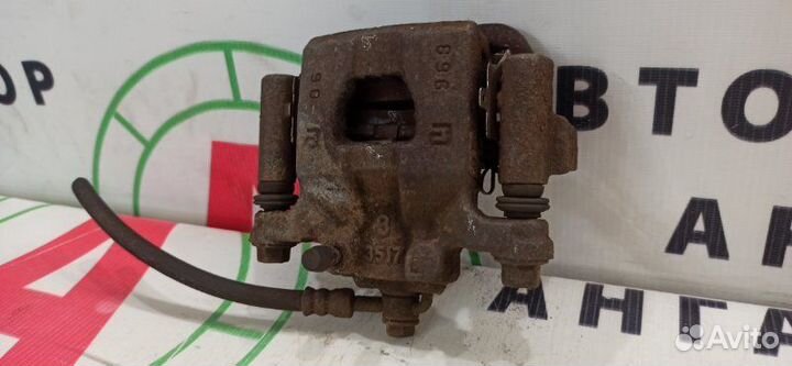 Суппорт задний правый Nissan Qashqai J10 HR16DE